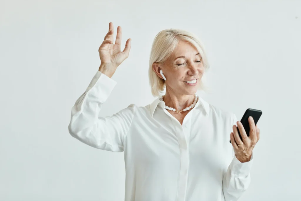 a women happy with her wireless earbuds for android