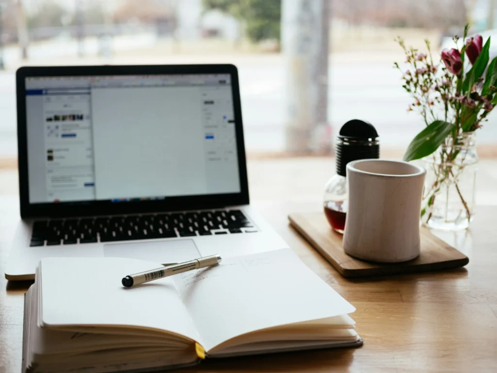 A laptop and diary